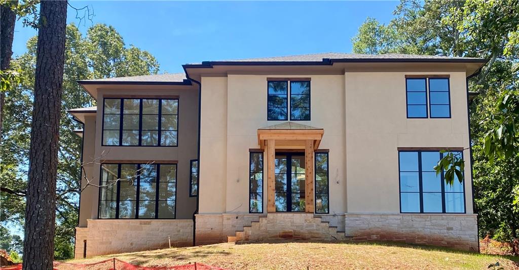New Modern Construction from award winning builder near Alpharetta city center. Walk to shops and restaurants. Completion early 2026
Open floor plan with two story Great room adjacent to massive kitchen with gourmet appliances. Massive Butler's Pantry with bar and storage. Upstairs hosts a large guest room plus three additional bedrooms each with private bath. Home office and laundry area also on upper level. Roof top deck.
Two story study with large high efficiency windows.
Large unfinished basement with tall ceilings ready for finishing.
Relaxing outdoor space with outdoor kitchen and pool!