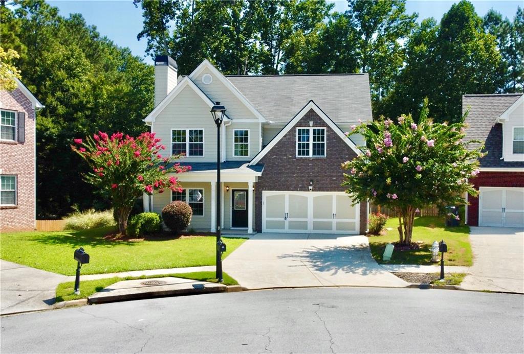 Welcome to 6351 Stewart Ridge Walk in Buford, GA - a beautifully updated two-story home offering the perfect blend of modern design, comfort, and everyday livability. From the inviting front porch ideal for morning coffee to the bright, freshly painted interior, every detail has been thoughtfully refreshed. Enjoy brand-new carpet and flooring, an open-concept layout, and a beautifully redesigned kitchen featuring new quartz countertops, white cabinetry, and stainless steel appliances that open effortlessly to the family room — perfect for both everyday living and entertaining. The spacious primary suite offers a peaceful retreat filled with natural light, while additional bedrooms provide flexibility for guests, family, or a home office. Step outside to a private fenced backyard perfect for gatherings or relaxation. Easy access to great Gwinnett schools, Lake Lanier, Sugar Hill City, Buford City, City of Duluth, Peachtree Industrial, Buford Drive, 400, 85, 985, restaurants, shopping, and more. This immaculate, move-in ready home combines location, lifestyle, and timeless appeal — schedule your private showing today and experience all that this home has to offer