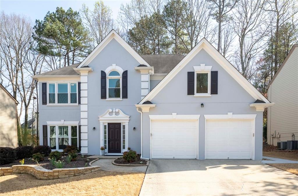 10715 Glenbarr Drive, Johns Creek, Georgia image 1