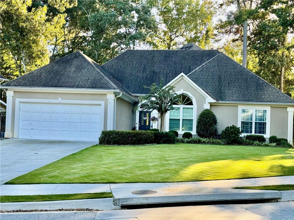 Welcome to your spacious 1 level, 3 bedroom 2 bath Ranch home in the highly sought after peaceful N Atlanta Fulton County community with top rated schools. The community has a large pool with diving board, tennis courts, and a playground as well as a small creek nearby. Just minutes to Avalon shopping and the Alpharetta Downtown area. This home is move-in ready condition with some recently updated items. New windows, driveway, lawn and sprinklers. Kitchen has been updated with quartz countertops and freshly painted cabinets. Beautiful soaring ceilings and multiple large windows makes the living and kitchen areas bright with sunlight. The master bedroom has high trey ceilings and a large walk-in closet as well as a generously sized bathroom with dual sinks and a jetted tub. Well maintained with a fully fenced in backyard and deck. Some areas of the home are upgraded for accessibility - Guest shower with grab bars, front walkway to the door has new concrete to make it accessible for wheelchair if needed. The doorways are wider as well as the hallway to make access easier. The third bedroom has tiled flooring instead of carpet. Great location with easy access to GA400. Property taxes reflect senior tax rate. Property sold As-Is. Buyer to verify all details.