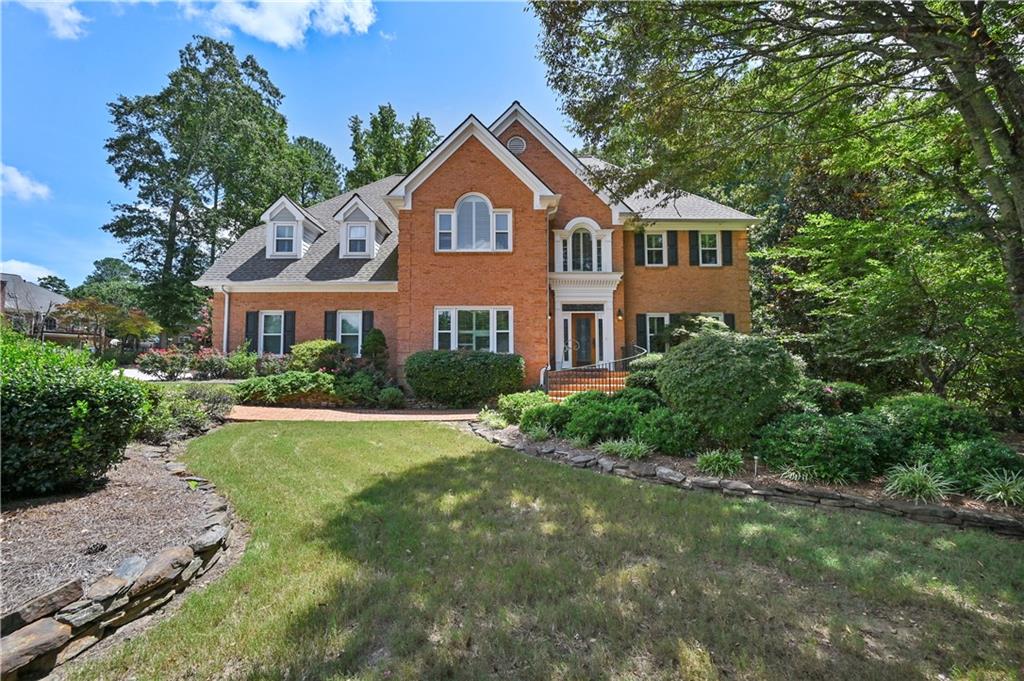 Discover an extraordinary rental opportunity in this spacious 6,888 sq. ft. residence designed for comfort, elegance, and multi-generational living. The thoughtfully planned layout offers multiple living and entertaining spaces, including: a private library/front office, a two-story keeping room with a stunning fireplace, a formal dining room and large breakfast area, a bright two-story living room, and a four-season room with a gas fireplace overlooking the serene garden oasis.Outdoors, you’ll find a tranquil koi pond surrounded by lush greenery, stone pathways, and a private terrace area—perfect for relaxation or quiet moments away from the rush of daily life.The Chef’s Kitchen features custom cabinets, high-end stainless appliances, quartz countertops, pot filler, and a designer backsplash. A large bedroom with a full bath is conveniently located on the main level.Upstairs, the expansive owner’s suite includes a spa-inspired bath and oversized walk-in closet, along with three additional bedrooms, each with ensuite baths and custom closets.The finished terrace level offers a secondary entertainment area, a large office, and abundant storage. Additional conveniences include a main-level laundry room and mudroom.This home is ideal for multi-generational living and those seeking both luxury and functionality—all within a private and peaceful setting.