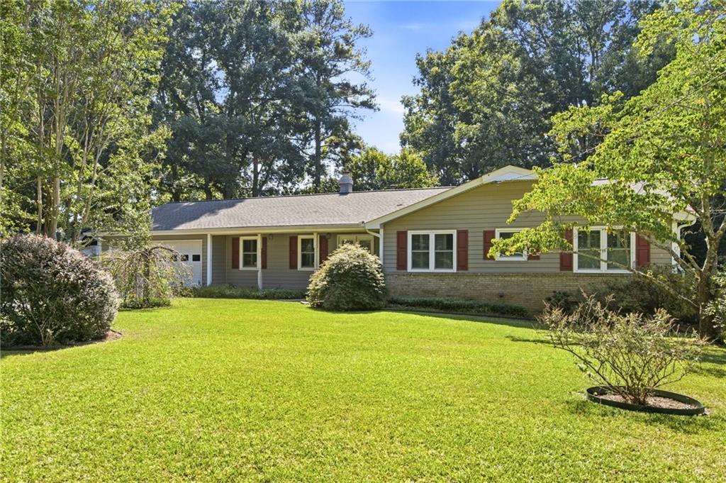 Photo of 56 Bonnie Lane NW, Lilburn, GA 30047 (MLS # 7839396)