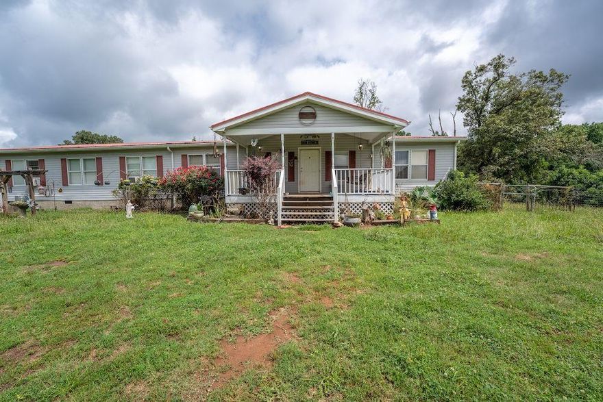 Welcome to your dream Homestead! This property is zoned Planned Commercial Farm District (PCFD) the highest level of ag zoning in the County. Making it ideal for farming or homesteading. This spacious home features an open floor plan with a large living room, kitchen, with island and pantry, and a dining area perfect for entertaining. The master bedroom layout offers privacy, includes a walk - in closet, and second full bath. Enjoy peaceful views from back deck while soaking in the hot tub! The property includes multiple outbuildings, fencing, and auxiliary house that could be renovated for a tenant , guest home, or storage. All just 10 minutes away from Commerce and 20 minutes to Gainesville!
