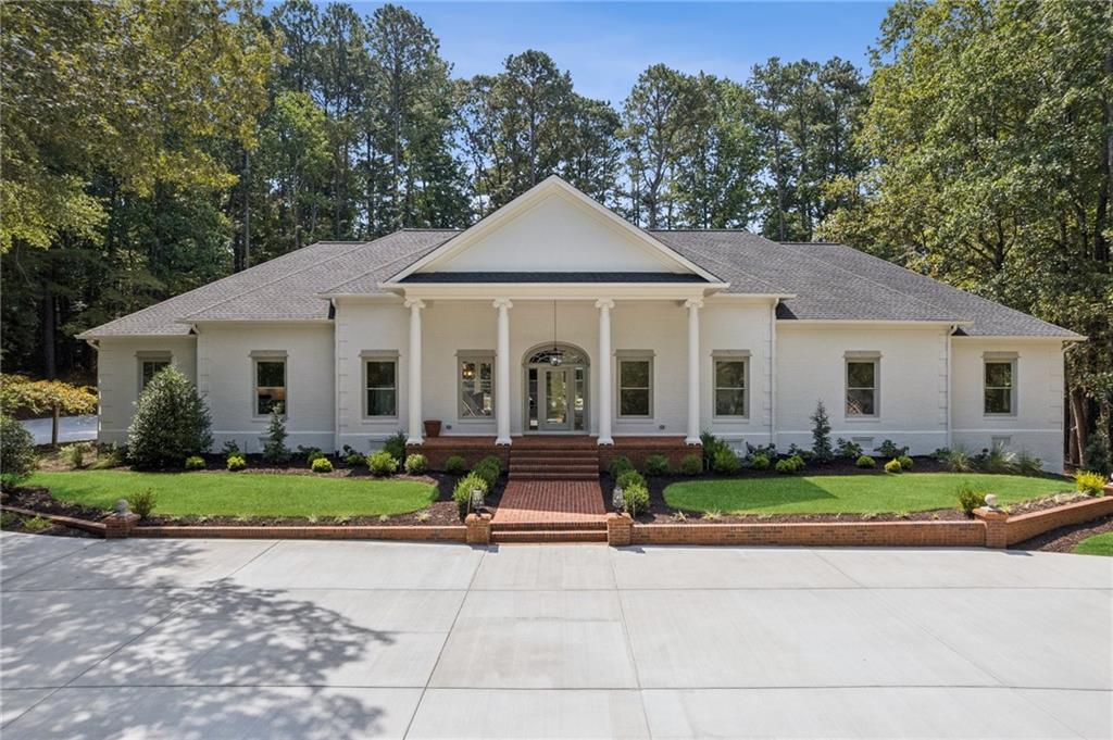 Completely Upgraded Luxury Home with Saltwater Pool in Alpharetta’s Coveted Hopewell Plantation
Welcome to 2355 Hopewell Plantation Drive – a truly stunning residence that has been 100% upgraded with the highest-end finishes, offering an unmatched combination of modern luxury, functionality, and timeless design.
As you arrive, you’ll notice the brand-new concrete driveway, professional landscaping, and all-new gutters that highlight the meticulous exterior updates. Step inside to discover an expansive open floor plan anchored by a massive chef’s kitchen island, state-of-the-art appliances, and elegant finishes designed for both entertaining and everyday living.
The main living spaces open seamlessly to refinished covered rear deck, overlooking your private backyard oasis. Here, a custom saltwater pool with waterfall feature creates the ultimate retreat, surrounded by lush landscaping for beauty and privacy.
The partially finished terrace level adds flexibility with a spacious recreation room and a full bathroom – ideal for entertaining, guests, or a future expansion.
Car enthusiasts and hobbyists will love the all-new garage doors leading to a huge workshop with soaring ceilings, providing ample space for projects and storage.
Additional highlights include:
Completely upgraded interiors with luxury finishes throughout
Saltwater pool with waterfall feature
All-new covered rear deck for year-round outdoor living
Professional landscaping and new concrete driveway
Partially finished basement with full bath and recreation room
All new garage doors and oversized workshop with high ceilings
This home represents the rare opportunity to own a like-new residence in one of Alpharetta’s most sought-after communities. With every detail carefully considered and executed, 2355 Hopewell Plantation Drive is move-in ready and designed to impress.
