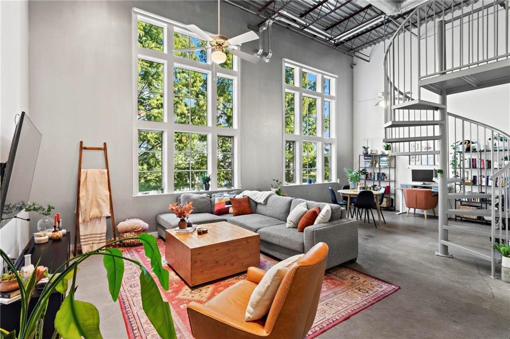 Amazing opportunity to lease a two-story, penthouse level loft on the Beltline in a cool Old Fourth Ward building! Soaring 18 foot ceilings provide a dramatic impression from the jump and the polished concrete floors seamlessly connect the foyer to the open gathering spaces. The gourmet kitchen will impress any at-home chef (or UberEats expert, we don't judge) with its recently upgraded Quartz countertops, trendy backsplash, breakfast bar seating, and high-grade stainless steel appliances. The all-new bathroom feels more like a luxury spa with its high-end lighting, sleek tile selection, custom built-in storage solutions and oversized tile shower. Don’t miss the supersized walk-in closet too! Upstairs, the primary bedroom is a true retreat overlooking the entire loft. Laundry room off the foyer and washer and dryer are included! Super quiet unit on the top-floor with friendly neighbors all around. One assigned parking space in the gated lot and ample street parking. Tenant is only responsible for their power bill, as all other utilities are included. This location is truly unmatched; you're just steps away from the bustling Atlanta Beltline Eastside Trail with hot spots like Emerald City Bagels, Guac y Margys, Hawkers, and all of Krog Street Market at your fingertips. Fun nightlife is a quick stroll down Edgewood Ave to iconic destinations like Sister Louisa’s Church Bar and Joystick Gamebar. Chrome Yellow to satisfy that need for caffeine every morning! Ditch the big apartment building life and come join Dynamic Metal Lofts, a boutique building with less than 40 units total. You better hurry, this special opportunity won't last for long! **Flexible lease start date, inquire with listing agent.**