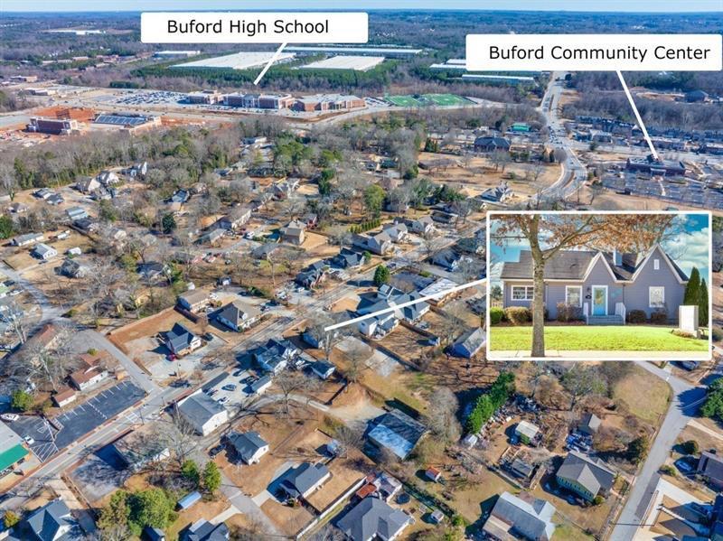 This unique commercial property is located in the heart of Downtown Buford, a vibrant and sought-after destination known for its charm and bustling atmosphere. Situated in a prime location with sweeping access to Mall go Georgia, Lake Lanier, and Downtown Buford itself. This property combines the convenience of a residential home with the potential for commercial use, offering versatile opportunities for business owners or investors. The home/office is a 3 bedrooms, 1 bathroom, and an open, inviting floor plan that seamlessly blends residential comfort with commercial potential. Large windows throughout the property, creating a welcoming atmosphere for customers and residents alike. With a prime street frontage, the property offers high visibility and easy access for both foot and vehicle traffic. Zoned for mixed-use, it provides endless possibilities, whether as a boutique business, art gallery, cafe, or office space, while maintaining its residential character. The exterior features allow plenty of parking spaces & walking accessibility. This property's location in downtown Buford adds tremendous value, with nearby attractions, restaurants, and shops contributing to its appeal for both business and residential purposes. Ideal for those looking to work in one of the most desirable areas of Buford, it offers an exceptional opportunity to capitalize on the growing demand for properties that blend home and commercial space.