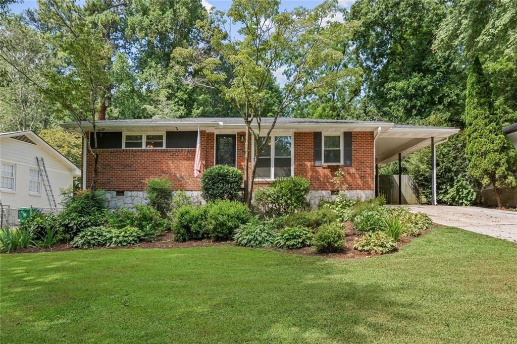 Updated and renovated 3-bedroom / 2 bathroom home in Fernbank Elementary School District. The living space has been opened up and the kitchen has been fully renovated with stone counters, new cabinets, and stainless steel appliances. The primary suite added onto the back of the home features a walk-in closet, en suite bathroom with double sinks, and double doors to the back yard deck. The backyard is fenced and renovated with a large back patio and bonus storage in the storage shed. Hardwood floors throughout the property and a covered, attached carport with bonus off-street parking. Close access to stores and restaurants. Credit and criminal reports required.