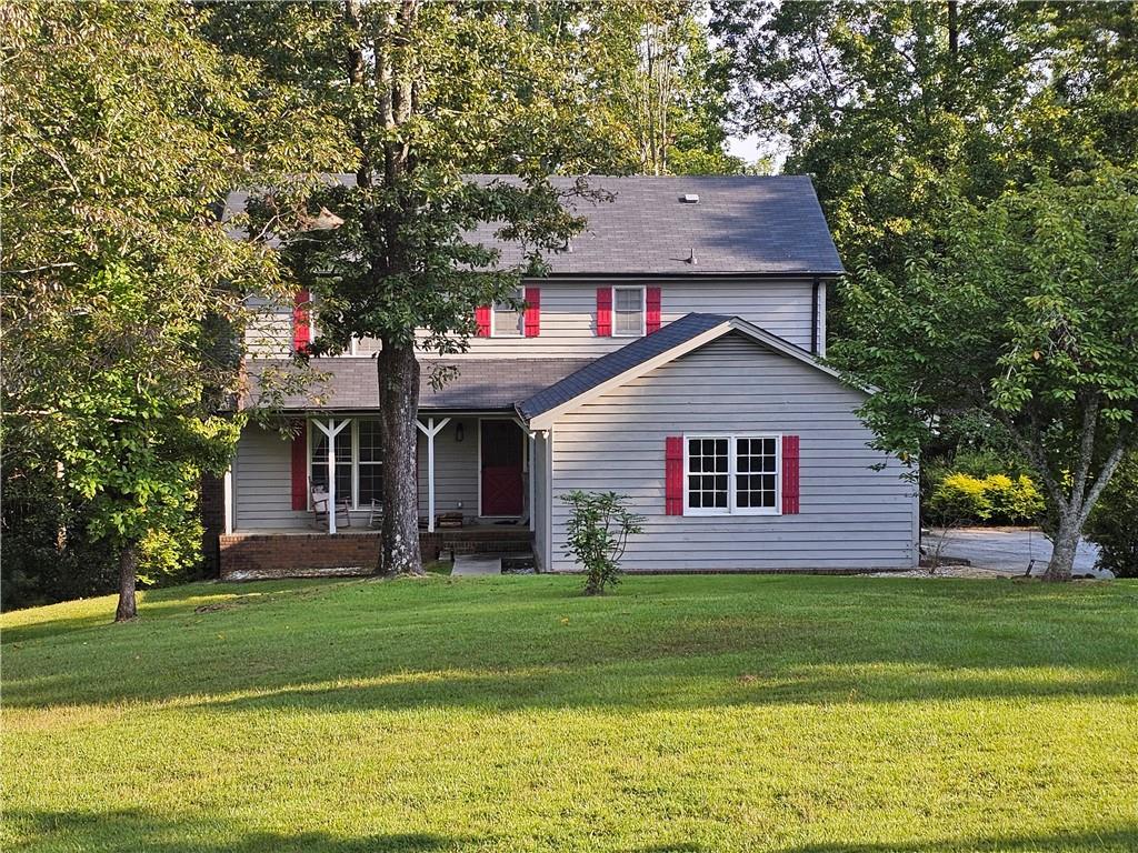 Huge Yard! This home boasts a 3 acre lot. Filled with Dogwood and Magnolia Trees. 4 Bed 2.5 Bath. In a well-established neighborhood. Eat-in kitchen with a large bay window. Formal Dining Room. Large 2 car garage. Fireplace on main level and basement. Basement could be easily finished, outlets already in place. Newer roof and HVAC systems.