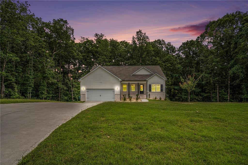 Spacious 4BR/3BA Home Minutes from Jackson Lake – Finished Basement & Major Upgrades! Located in peaceful Mansfield, GA, this beautifully updated 4-bedroom, 3-bathroom home offers the perfect blend of modern comfort and serene country living, just 30 minutes from downtown Covington, famously known as The Hollywood of the South. Step inside to find gorgeous hardwood floors and a chef’s kitchen with granite countertops, ideal for cooking and entertaining. The home’s open layout is warm and inviting, with generous space in every room. Even better, the seller has finished the full basement, adding valuable square footage for a home theater, guest suite, game room, or office. There is also a new and much larger two-story back porch, making it the perfect spot for relaxing or hosting gatherings. Other recent upgrades include a brand-new, high-quality roof (a step above standard builder grade), giving peace of mind for years to come. Located just minutes from beautiful Jackson Lake, this property is ideal for nature lovers, lake-goers, and anyone looking for a peaceful retreat that’s still close to the action.