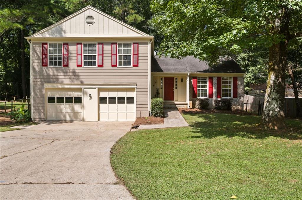 You’ll love the easy living at 615 Barrington Way in Roswell’s Barrington Farms—an established, no-mandatory-HOA neighborhood near GA-400, Big Creek Greenway, North Point, and top-rated schools. Step inside to a bright, airy living room that flows into a bright, naturally lit kitchen—updated with newer appliances (2021)—and an adjacent dining room, ideal for everyday meals and gatherings. The separate lower level offers a spacious family room/den with a cozy gas fireplace and easy backyard access, while upstairs an oversized primary suite joins two additional bedrooms with generous closets and new carpet (2024) for flexible sleep, guest, or office space. Thoughtful updates deliver peace of mind: retiled shower (2021); new siding & exterior paint (2023); new double-pane windows (2023); fresh interior paint (2024); durable LVP floors (2024); new water heater (2024); newly rekeyed locks (2024)—plus a freshly painted deck (2024), pressure-washed sidewalk, porch, and driveway, and a fenced yard. Step outside to enjoy a quiet backyard retreat, or take advantage of nearby parks, trails, and shopping. Smoke-free and pet-free, it’s updated where it counts with room to personalize over time. With no rent restrictions and an optional neighborhood association, this is a great little home in a prime Roswell location—character, convenience, and $30K+ in recent improvements all in one. 2-10 Home Warranty Available.