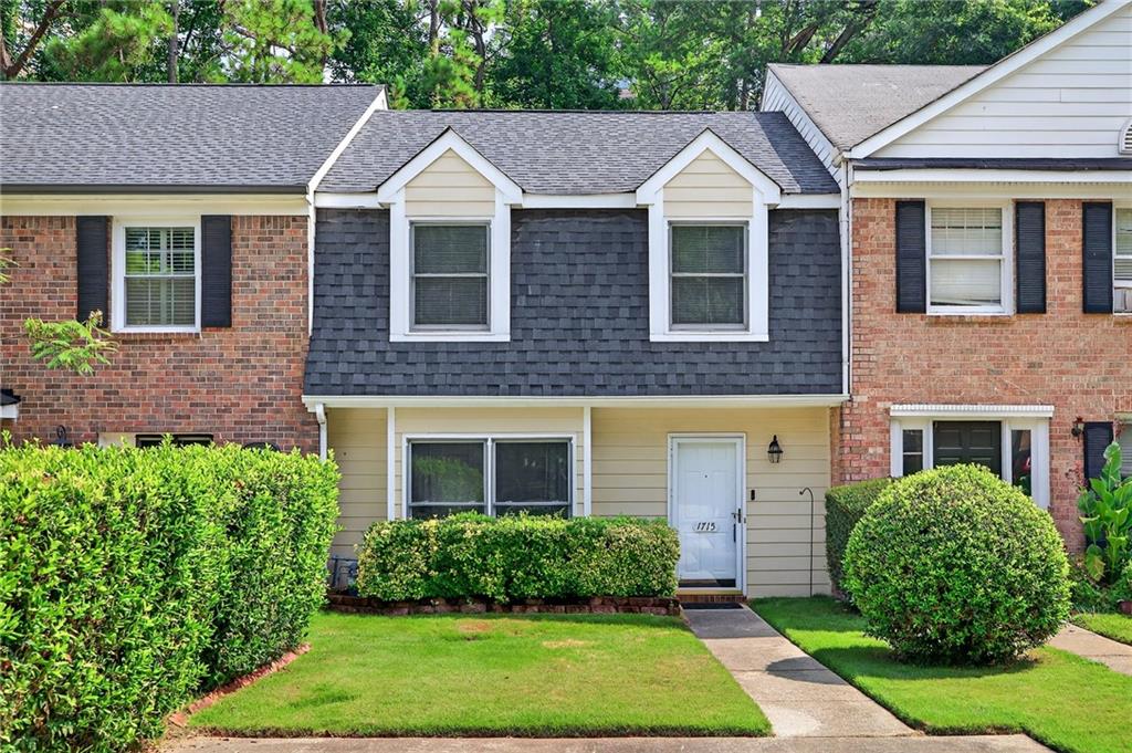 Welcome to this charming recently remodeled townhome in the desirable Twin Brooks community of Marietta! This 2-bedroom, 2-bathroom residence offers a perfect blend of comfort and convenience. Step inside to an inviting living room featuring a cozy fireplace, ideal for relaxing evenings. The updated kitchen provides a welcoming space for meals and gatherings. The primary suite is a private retreat with walk in closets and an en-suite bath with a recently remodeled bathroom. Enjoy the outdoors in your private, level backyard, perfect for entertaining or quiet relaxation. Ample storage throughout, this home offers both practicality and a fantastic location close to Located in the highly coveted I-75 corridor minutes away from interstate, shopping, restaurants, and the Braves stadium. NO HOA and NO RENT RESTRICTIONS. Practical roommate floor plan. Don't miss this opportunity to own a wonderful home in a sought-after neighborhood!