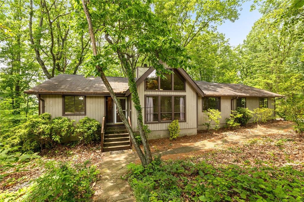 Fantastic opportunity for a soft contemporary in desirable Piedmont Bend. Exceptional floorplan featuring a spacious master bedroom on the main level, open layout with vaulted ceilings, large living room, separate dining room, eat-in kitchen with stainless appliances and deck overlooking large private backyard. Huge partially finished basement with walk-out access to backyard offers tons of additional space with plenty of room to add a fourth bedroom, rec room, media room, etc. House is situated on a wonderful cul-de-sac lot in a great neighborhood minutes to shopping, restaurants and much more!