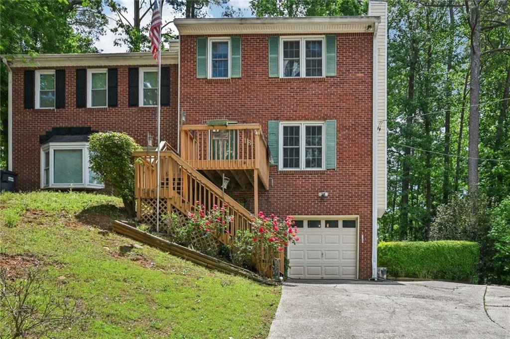 Experience the charm of this dream townhome near Marietta Square and Truist Park & Braves! Perfectly situated just minutes from Life University and Cumberland Mall, this inviting haven offers unparalleled access to delightful dining and vibrant entertainment. Step inside to find spacious bedrooms, a serene private wooded deck ideal for unwinding or hosting friends, and fantastic features like a walk-in pantry, a luxurious walk-in tub, and an oversized laundry room to make life easier. With no HOA fees, you’ll enjoy the freedom and affordability you desire. Quick access to I-75 and I-285 ensures your commute is a breeze, while nearby shopping and outdoor adventures on the Silver Comet Trail beckon you to explore. Timber Creek Estates is flourishing, with recent renovations boosting property values, making this not just a home, but an investment in your future. Don’t let this incredible opportunity slip away—your perfect sanctuary awaits!
