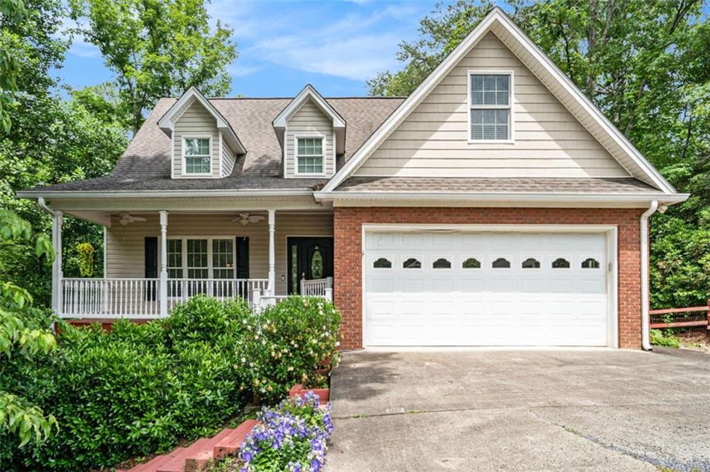Location, location, location! This spacious 5-bedroom (possible 6th), 3.5-bath home offers the best of both worlds-less than 5 miles to shopping and restaurants, yet it feels like you're tucked away in the countryside. Step inside to an expansive living room with vaulted ceilings, a corner fireplace, and tons of natural light from all the windows. The main level flows right into the kitchen, which features stainless steel appliances, a walk-in pantry, and plenty of cabinet space. You'll also find the dining room, laundry room, half bath, 2-car garage, and the oversized primary suite all on the main floor. The primary bedroom has plenty of room to arrange your furniture however you'd like, and the bath includes a soaking tub, separate shower, water closet, and comfort-height counters. Off the dining area, step onto the covered and screened-in back porch-perfect for enjoying the outdoors bug-free. There's also a large grilling deck just off the porch. And with 1-step entry from the garage, it's easy to bring in groceries or guests. Upstairs, you'll find two more bedrooms, a full bath, a loft area, and a bonus room that's perfect as a home office, playroom, craft space, library-or even a 6th bedroom or bunk room. The fully finished basement offers two bedrooms that could also be turned into a media room, game room-whatever suits your needs-along with a full bath. High ceilings and a walk-out patio make the space feel open and connected to the backyard. There's also a large unfinished storage area for all the extras. This home offers flexibility, space, and a great location-come see it for yourself!
