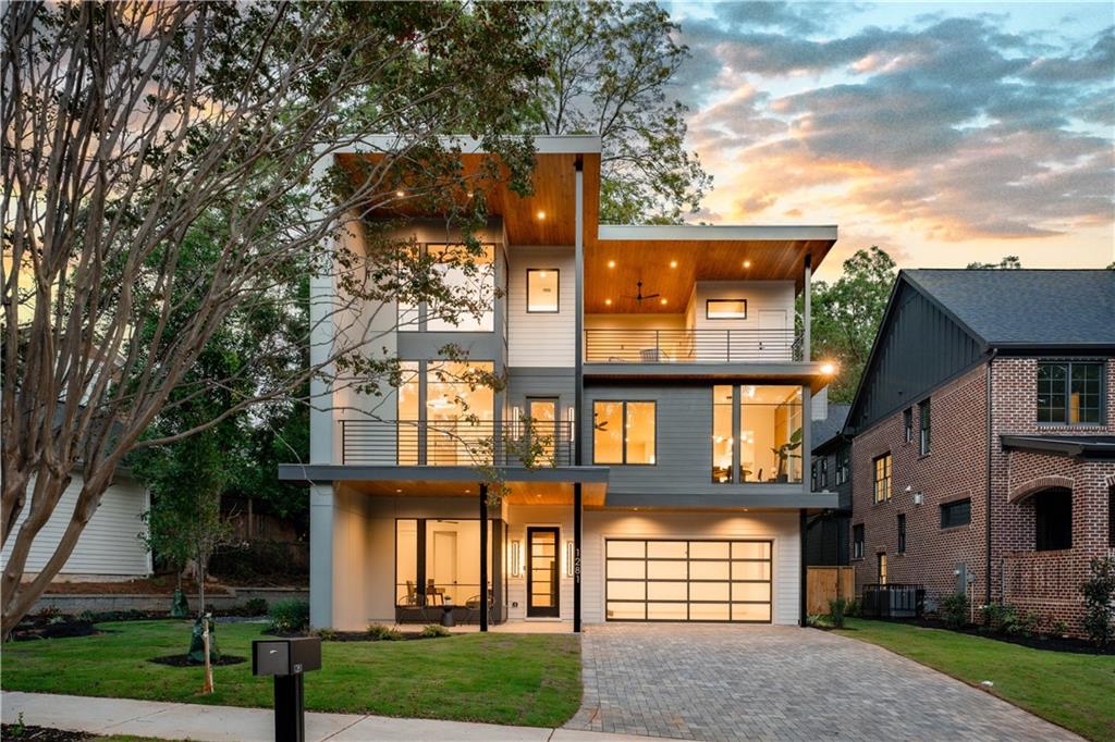 The PERFECT modern home on one of Morningside’s quietest & most sought after streets! Every amenity is realized spanning three full floors of modern luxury & intentional design. The heart of the home is a spacious living & kitchen area, perfect for entertaining, with timeless finishes that include wolf & subzero appliances, quartz counters & backsplash, a hidden pantry, white oak paneling, & custom fireplace insert that frames the living room. Seamlessly transition to indoor/outdoor living opening the accordion glass wall that leads to one of FOUR outdoor living spaces overlooking the professionally landscaped backyard including pool & spa by RCS. Upstairs you’ll find two secondary bedrooms with private baths, a custom designed laundry loaded with amenities, & THE matchless owners suite boasting a one of one spa-like marble bath & walk in closet…effortlessly merging serenity, luxury, & function. Downstairs a sun drenched bedroom ideal for guests or a home office & attached bath provide the perfect flex space. Next you’ll discover the second living room centered by a sliding glass eastern wall that brings the outdoors in & sets up the perfect entertainment lounge off your brand new pool & spa! If that’s not enough spend the rest of your waking hours relaxing or entertain (or both!) on your private rooftop deck overlooking the forested trees of Morningside!
Other incredible highlights include white oak floors throughout, custom millwork and white oak acoustic paneling, Pella windows, over 1000 sq ft of covered porch and outdoor living space including the tree lined roof top deck, an attached 2-car garage, and turfed rear yard. Location is everything, and this home’s location defines EXCELLENCE. Avalon is a one block non-through street with easy access to local restaurants, shops, the Beltline, Piedmont Park, Emory, & limitless recreational activities.
So close to Alons Bakery, Virginia Highlands, & Orme Park. Brilliant!