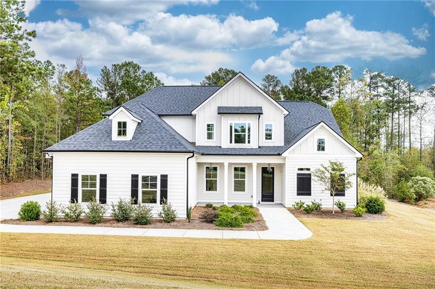 ASK ABOUT OUR 5.75% FIXED RATE FOR QUALIFIED BUYERS!! Welcome to 20 Platinum Ridge, Sharpsburg, GA-featuring the stunning Autumn Brooke Plan by Dustin Shaw Homes! This thoughtfully designed home offers exceptional flow and functionality, perfect for modern family living.    Main Level Highlights:  A vaulted family room with a cozy fireplace, creating a warm and inviting space to relax.  A spacious kitchen with granite countertops, custom cabinets, and a walk-in pantry-perfect for entertaining or everyday living.  A versatile keeping room just off the kitchen, ideal for additional dining, entertaining, or a home office.  The owner's suite spans an entire wing, featuring a generous bedroom, a luxurious bath, and a divided walk-in closet for the ultimate in organization.  Convenient access to a mudroom, laundry room, and a small covered porch for practicality and convenience.  Upper Level:  Three additional bedrooms and two full baths, including one with an en suite-perfect for guests or family members seeking privacy.  Outdoor Living:  The backyard oasis boasts an expanded covered porch overlooking a private yard, ideal for outdoor gatherings or quiet evenings.    Finishes:  This home is built to Platinum Ridge standards with tile, hardwoods, granite countertops, custom cabinets, and plush carpet throughout.   Schedule your tour today and discover the perfect blend of style, comfort, and quality craftsmanship at 20 Platinum Ridge! Don't miss your chance to make this stunning new construction your dream home. Ask about builder incentives with preferred lender.