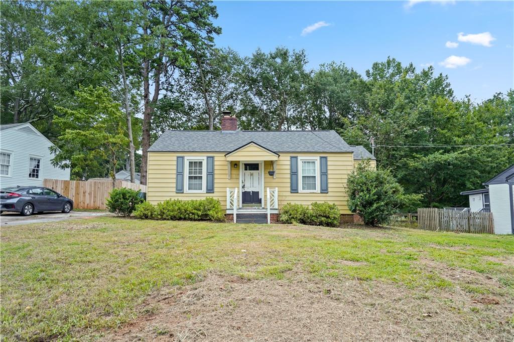 Charming home situated in a beautiful neighborhood walking distance from the Marietta Square! This is a cozy 2BR/1BA with original hardwood floors. There have been some updates on lighting, crown molding, new cabinets and fixtures. Open & updated kitchen/dining area, with some small renovations needed, making the finishing touches your own. The bathroom has been updated somewhat, with new ceiling fans and lighting. Breath taking back yard. Walking distance to Marietta Sq and park. This is an amazing home. Close to I-75 Express Access, Close to I-285, 45 minutes from Hartsfield Airport. 20 minutes from The Roxy, Atlanta Battery and Truist Park. Close to Little Kennesaw Mountain and the Chattahoochee River for all your outdoor recreation needs. Lots of Restaurants and Shopping Options on the Square, along Cobb Parkway, at Cumberland Mall and Town Center Mall. On a CCT / Bus route. 3-minutes from KSU's Marietta Campus and 15 mins from KSU's Kennesaw location.