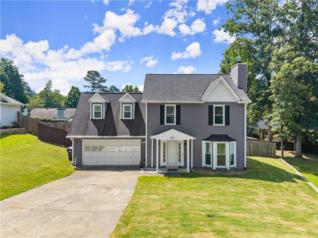 Up to $4000 Lender Credit***Welcome to this charming 3-bedroom, 2.5-bathroom two-story home nestled in a peaceful cul-de-sac in Sugar Hill. With a spacious 2-car garage and a large privacy-fenced yard, this property is perfect for outdoor entertaining. The freshly painted interior features bright kitchen cabinets and stainless steel appliances, along with a formal dining room and inviting living room on the main level. Upstairs, you'll find 3 comfortable bedrooms, 2 full baths, and a convenient laundry area. Enjoy the freedom of no HOA fees and explore the excellent rental potential this home offers. Don't miss out on this fantastic opportunity!