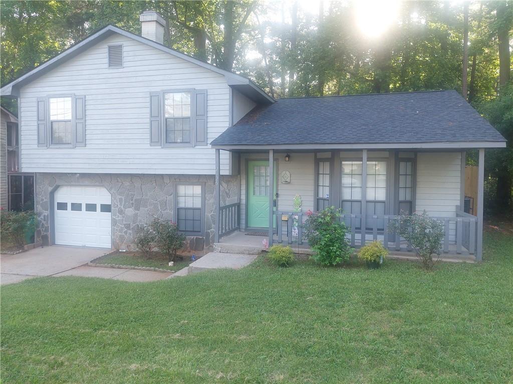 Beautifully maintained and updated new roof, ac, hot water heater, fresh paint, flooring, lighting, fixtures, cabinets, quartz countertops & so much more. Ready to move in. Great room, with view to the kitchen and dining area, well equip kitchen with SS appliances. dining area with access to the patio and fenced back yard. Lower-level family room, tranquil owner's suite w/ private bath, bring your king size bed. 2 Ample size secondary bedroom. Cul-de-sac lot. great access freeway, downtown Decatur & Stone Mountain Village & Park.