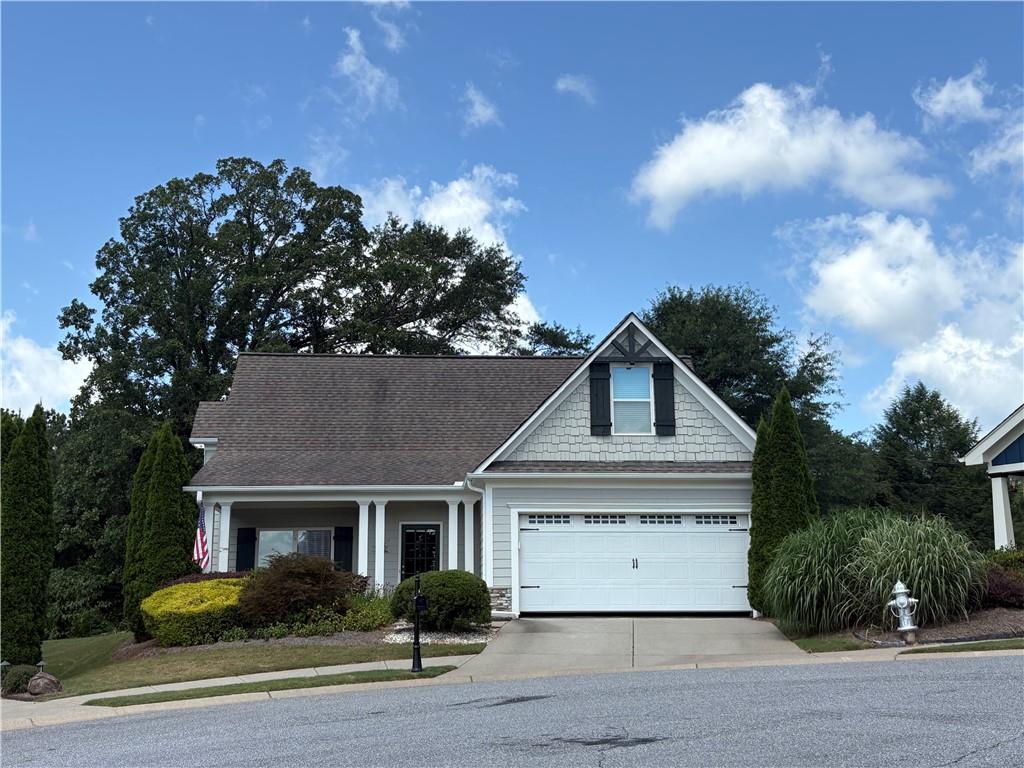 Ball Ground Georgia 30107 is THE zip code for choosing the great life. Great location, well planned community and super convenient for everyday living. Travel to work? No problem, jump on 575 and head North or South. Minutes from Canton, Alpharetta and Cumming. Home offers first floor living with primary bed, bath, laundry and garage a few steps from kitchen. Screened porch invites you to have a cold glass of tea or a morning cup of coffee. Family living upstairs with 3 nice size bedrooms and bath. Create a home office or fix rooms for guests. Options for your creativity to become reality. If pickle ball, morning coffee or a nice long walk to Long Swamp Creek interest you then you really need to put this one on your wish list. The charming downtown area of Ball Ground feature unique shopping and dining. Ice Cream or New York Style pizza and a stroll through Calvin Farmer Park round out a great day in the tiny city with the big heart. Welcome to the best kept secret in North Georgia. Retirement or first time buyer this home will not last!