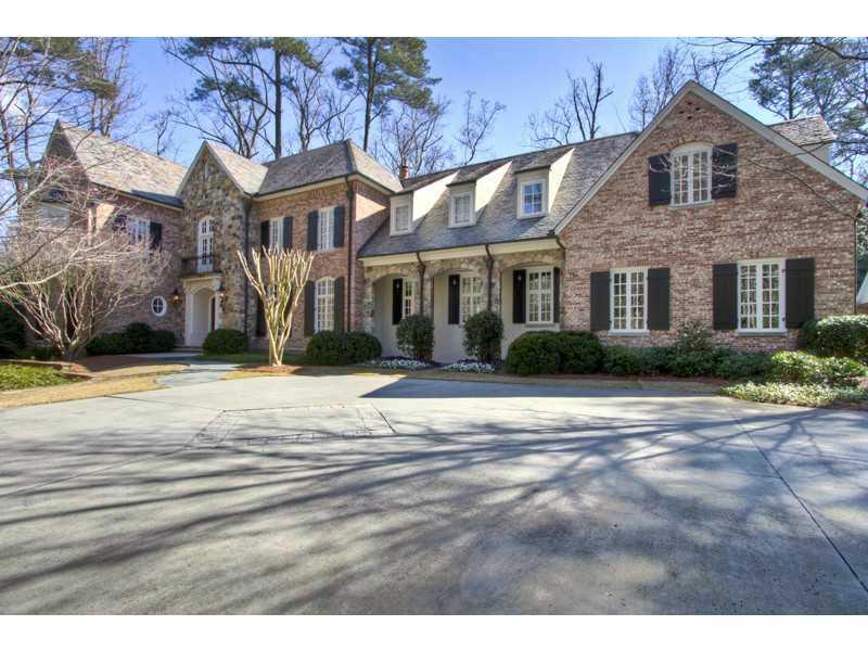 Absolutely splendid home in prestigious Tuxedo Park. Tremendous curb appeal, wonderful floor plan with gracious and comfortable entertainment areas. Master suite on main with gorgeous paneled library and his and her baths. 12 foot ceilings on main provide wonderful natural light, walk out private back yard with pool and pool house/pavilion, wine cellar, theatre, rec room, exercise room, 3 car garage Design by Nancy Braithwaite, architect Duane Stone and Construction by Bradwell Properties. Terrific home in great condition!