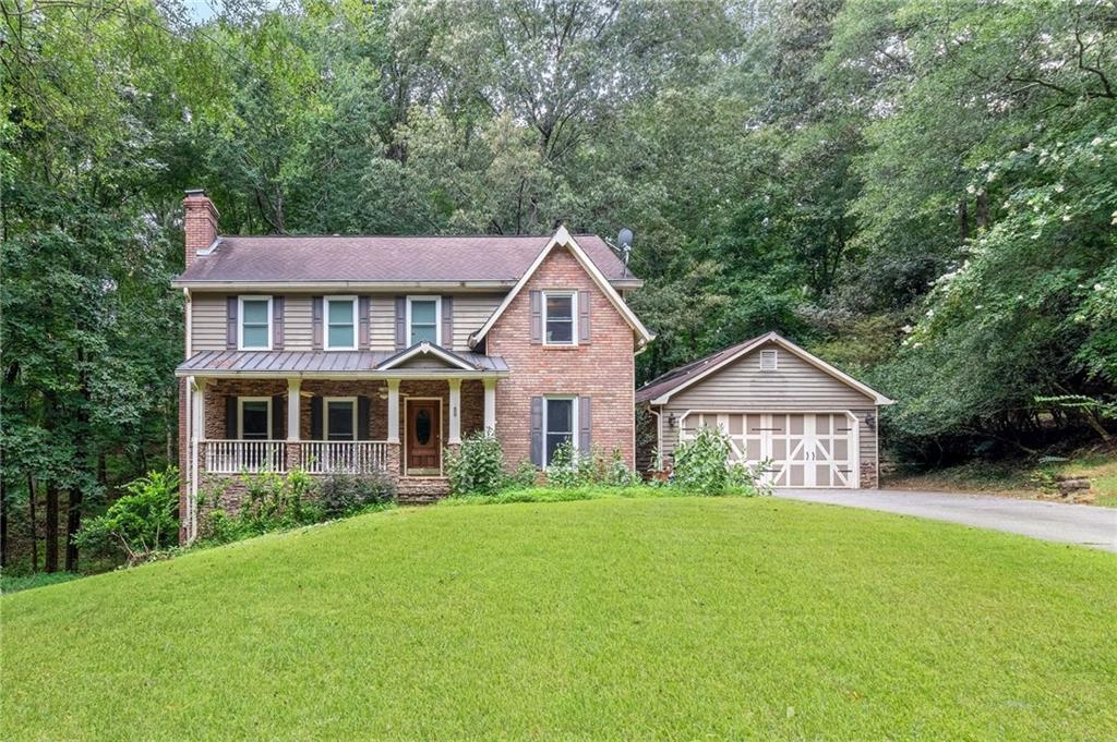 Location is everything and this home is no exception! Sitting on just under a 1-acre lot, this spacious home boasts a finished terrace level, an in-ground solar heated pool, a detached garage including a workshop area, and so much privacy. There is so much potential here in this great home which makes it a must see. This 5 bedroom, 3 and 1/2 bath property features a custom kitchen with stainless appliances, stained cabinets, corion counters, and a view to the sunroom which overlooks your private back yard oasis. The upper level offers 4 bedrooms including the master retreat with a jetted tub, separate shower, and double vanities. The finished terrace level provides another living area with a fireplace, office, bedroom area, and a full bathroom. Don't delay and call for your private showing today!