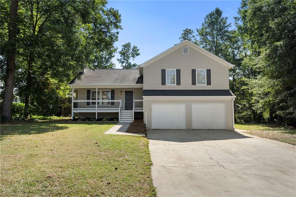 Just Listed! This beautifully remodeled split-level home offers 4 bedrooms and 2 full bathrooms on a spacious, private lot—perfect for those seeking comfort and style. The updated kitchen features white cabinets, granite countertops, a subway tile backsplash, and brand-new stainless steel appliances. Enjoy fresh LVP flooring and modern light fixtures throughout the main level, with new carpet in the bedrooms and durable LVP in the primary suite.
The interior has been freshly painted, giving the home a clean, contemporary feel. The spacious primary bedroom includes a walk-in closet and a stunning en-suite bath with a tiled standing shower, tile floors, and a brand-new dual vanity. Outside, the freshly painted exterior complements a large, level backyard—ideal for entertaining or creating your own private retreat. No HOA! Move-in ready and full of upgrades, this home won’t last long!