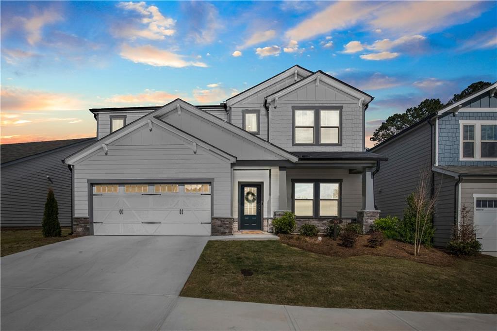 Welcome to 369 McDaniel Place, where affordability meets luxury and convenience! This stunning home is located in the highly sought-after Idylwilde community, right in the heart of everything. Step into this pristine, like-new 2022 build, featuring designer-curated finishes that will leave you breathless. The light and airy flow, tall ceilings, and beautiful kitchen are just the beginning of what this home has to offer. The spacious kitchen provides lots of counter space, storage, and a convenient walk-in pantry. As you explore the 2,775 square feet of living space, you'll discover 4 bedrooms, 3.5 bathrooms, a massive loft on the second floor, and a versatile flex room off the entryway. The main floor features a primary bedroom with elegant trey ceilings, a double vanity, and his-and-her closets. But that's not all! Prepare to be amazed by the state-of-the-art amenities offered by Meadows at Idylwilde. The community features a large clubhouse with a rec room, pickleball courts, a refreshing pool, and even a community garden. Relax and take in the serene water view of the small pond from your covered patio, or go for a stroll along the small walking trail for your morning exercise. The upstairs welcomes you with a generous loft area, currently utilized as a second living space but offering endless possibilities for customization. Additionally, you'll find three more bedrooms and two full bathrooms. Convenience is at your fingertips with nearby shopping, dining, and entertainment options. Experience what 369 McDaniel Place has to offer by scheduling a visit today!