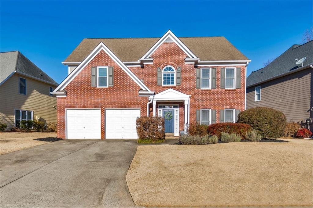 This timeless beauty is ready for you to move right in! Nestled in the sought-after St. Charles Square swim/tennis community, this stunning 4 bed / 2.5 bath East Cobb home offers a spacious and inviting floor plan. As you step inside, you are greeted by a two-story foyer and fresh interior paint throughout. The formal sitting and dining rooms provide elegant spaces for entertaining, while the beautifully updated kitchen features stainless steel appliances, a new sink and faucet, a gas cooktop with a vent hood, and a bright breakfast area. The kitchen overlooks the fireside living room with soaring ceilings that create a bright and airy atmosphere. Upstairs, the spacious primary suite boasts tray ceilings and two oversized closets while the en suite bath offers his and hers vanities, a jetted tub, and a separate shower. Three additional bedrooms share a well-appointed bathroom with a double vanity. Thoughtful upgrades throughout the home include updated lighting, engineered wood flooring, new thermostats, new door hardware, and new toilets. Outside, the pergola-covered patio and fenced backyard provide the perfect setting for relaxation or play. With modern upgrades and a prime location, this home is a must-see!