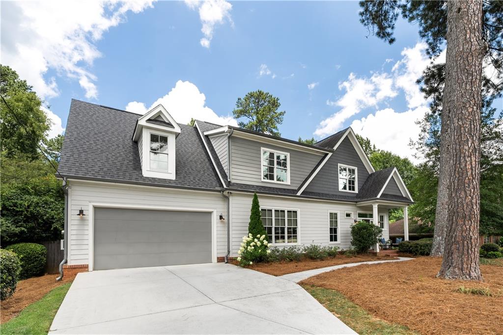 This custom built Sagamore home is overflowing with luxury features. Stunning kitchen w/ marble countertops, inset custom cabinetry, rift-sawn white oak appliance garage, Subzero refrigerator, Bertazzoni 48” dual-fuel range, & a massive walk-in pantry. The main living area is drenched in natural light & features a custom media built-in, fireplace, & 10 foot ceilings. First level bedroom + full bath also has a fireplace with another wall of custom built-ins. Upstairs you’ll find a generously sized primary suite w/ a resort level bath & large walk-in closet that connects w/ the laundry room. Three other bedrooms, two more full baths, and an incredibly versatile bonus space are also located on this level. The huge rear deck is perfect for entertaining or just enjoying the outdoors while overlooking the private & fully fenced backyard. The two car garage is prewired for an EV charger. Viewed by appointment only.
