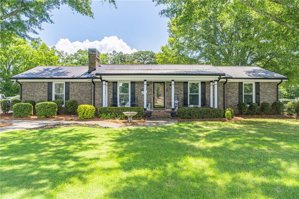 Charming Brick Ranch on 2 Acres with Scenic Views!
Welcome to this beautifully updated 3-bedroom, 2-bath brick ranch nestled on a spacious 2-acre lot. Enjoy peaceful country living with modern updates throughout! Step inside to discover rich hardwood floors, a cozy stone fireplace in the living room, and abundant natural light from brand-new windows.
The kitchen is a chef’s delight, featuring granite countertops, a breakfast bar, and plenty of entertainment space. Retreat to the screened back porch and take in the gorgeous, unobstructed open landscape views—perfect for morning coffee or evening relaxation.
Additional highlights include a brand-new HVAC system, a convenient storage shed, and a spacious lot ideal for both everyday living and entertaining. The large lot offers plenty of room to garden, add a pool, or simply enjoy the privacy.
Don’t miss this move-in-ready gem that blends comfort, style, and serene surroundings