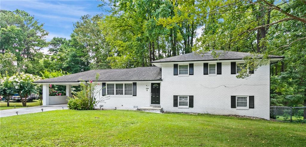 If you are looking to lease a property in the heart of East Atlanta, this is your opportunity! This spacious and recently renovated open-concept ranch offers 4 bedrooms and 2.5 bathrooms, including a private in-law suite with its own living area, bedroom, and full bath, perfect for guests, extended family, or a home office. Enjoy modern upgrades throughout, including stainless steel appliances, gleaming hardwood floors, and stylish finishes. The layout is ideal for both everyday living and entertaining. Step outside to a fully fenced backyard, perfect for pets, play, or relaxing outdoors. This house also features a long drivewary and carpot for parking convenience. Landlord is offering the option to be leased furnished or unfurnished, giving you the flexibility to move in with ease or bring your own personal touch. it is located on a prime area close to restaurants, parks, shopping and more. Don’t miss out on this move-in-ready gem.