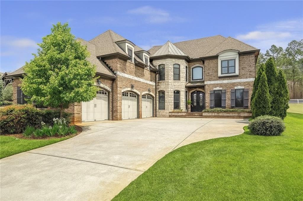 For Lease in Traditions of Braselton!
Welcome to this incredibly beautiful home located in one of Georgia’s hottest markets—Traditions of Braselton Golf Community! This stunning two-story home offers luxury, comfort, and convenience all in one of the most sought-after neighborhoods.
Step inside to find a gourmet kitchen with custom cabinetry, stainless steel appliances, and a large island that opens to the cozy keeping room—complete with its own fireplace. Just steps away, the spacious living room offers a second fireplace and serene views of the backyard. The main level also includes a formal dining room, a private study/office, a secondary bedroom/in-law suite, and a convenient powder room for guests.
Upstairs, you’ll find a luxurious primary suite with a separate sitting room and wet bar, perfect for unwinding at the end of the day. The ensuite bathroom features a jacuzzi tub, walk-in closets, and a separate shower with body jets. One of the secondary bedrooms upstairs has its own private ensuite bath, while the other two share a spacious Jack-and-Jill bathroom.
A three-car garage completes this incredible home, making it a rare rental opportunity in today’s market.
Enjoy resort-style living with Traditions of Braselton’s incredible amenities, including a championship golf course, resort-style pool and splash pad, tennis and pickleball courts, fitness center, miles of walking trails, on-site restaurant, and year-round community events.
More photos will be posted within the next week—stay tuned!
Don’t miss your chance to lease this one-of-a-kind home in one of Georgia’s premier communities!