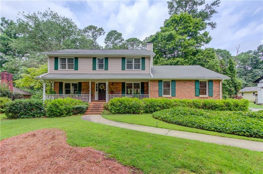 Don’t miss this beautifully maintained home nestled in a quiet, established neighborhood within the highly sought-after Brookwood school district. Step inside to a warm and welcoming main level featuring hardwood floors throughout the foyer, kitchen, and dining area. The spacious eat-in kitchen boasts corian countertops, stainless steel appliances and bay windows that flood the space with natural light and offer serene views of the private, wooded backyard.
Relax in the inviting family room with a large brick fireplace, perfect for cozy evenings. Upstairs, the oversized master suite offers vaulted ceilings and his and her closets. Enjoy your morning coffee on the rocking chair front porch or unwind on the peaceful back deck overlooking the tranquil, nature-filled setting.
The partially finished basement provides flexible living space plus an unfinished area ideal for storage or a workshop. Additional features include an oversized two-car side-entry garage with an extra storage room.  No mandatory HOA, but optional swim and tennis membership is available in the neighborhood. This home combines comfort, charm, and convenience in a top-rated school district, schedule your tour today!