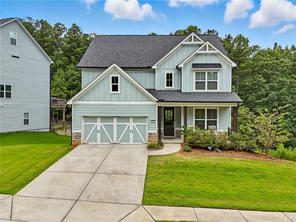 Welcome home to 179 Sweet Plum Trail, a move-in ready 4 bedroom, 3.5 bathroom residence located in the highly coveted, amenity-rich Seven Hills community in Paulding County. This spacious home offers an open and functional floor plan featuring luxury vinyl plank flooring throughout the main level, a separate office right off the entrance perfect for working from home, and a gourmet kitchen with granite countertops that opens seamlessly into the dining and living areas for easy entertaining. Upstairs you’ll find generously sized bedrooms, including a primary suite with a spa-like bath and walk-in closet, along with additional full bathrooms to accommodate family or guests. The unfinished basement provides incredible potential for future expansion, storage, or recreation space, while the fully fenced backyard delivers privacy and plenty of room to enjoy outdoor living. Beyond the home itself, Seven Hills is one of Dallas’ most sought-after neighborhoods, known for its resort-style amenities including a massive water park with slides and splash areas, tennis and pickleball courts, playgrounds, sports fields, a clubhouse, walking trails, dog park, and year-round community events. With its combination of space, style, and location just minutes to shopping, dining, and top-rated schools, this property offers the perfect opportunity to enjoy the very best of Paulding County living.