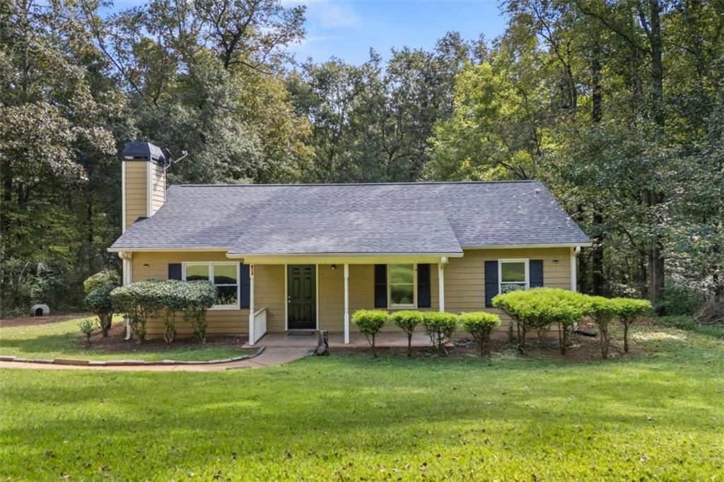 Charming 3-Bedroom Country Home on 1.7 Acres - Peaceful Living Just Outside the City! Welcome to your private slice of country paradise! This beautiful 3-bedroom, 2-bathroom home offers 1,200+ sq ft of comfortable living space and is nestled on a spacious 1.7-acre lot, surrounded by nature and open skies. If youre looking for a quiet place to call home, this property has the charm, space, and serenity youve been searching for. Inside, you'll find a warm, inviting layout with al spacious living area with a cozy fireplace, a functional kitchen, a huge pantry/laundry room and tons of natural light streaming through every window. The primary suite includes its own full bath for added privacy and convenience. Step outside and enjoy the peace and quiet of country living - with plenty of room for a garden, outdoor entertaining, or even a few chickens. The large lot offers endless potential for hobby farming, expansion, or simply enjoying your own wide-open space. Enjoy starlit nights, quiet mornings, and fresh country air
