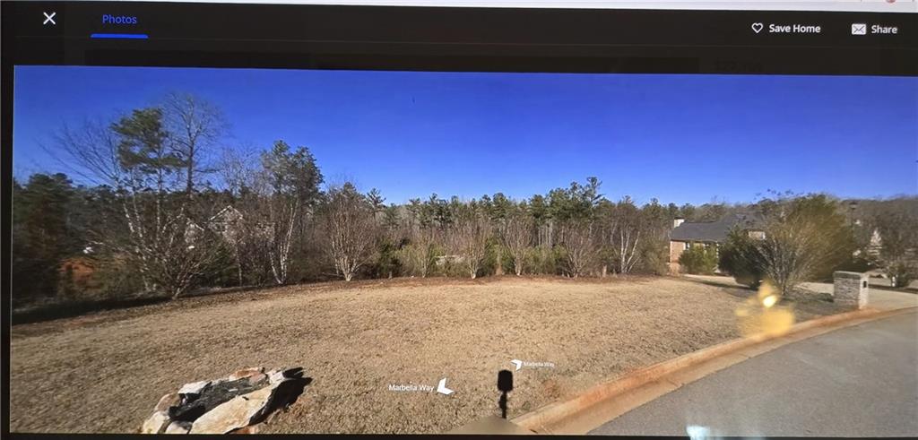 LOT FOR SALE in a Custom Built Community. Create your own luxury, exquisite family home located on a private approximately 2.8 acre lot in the prestigious Woodmont Gardens community! Located in the sought-after Ola School district