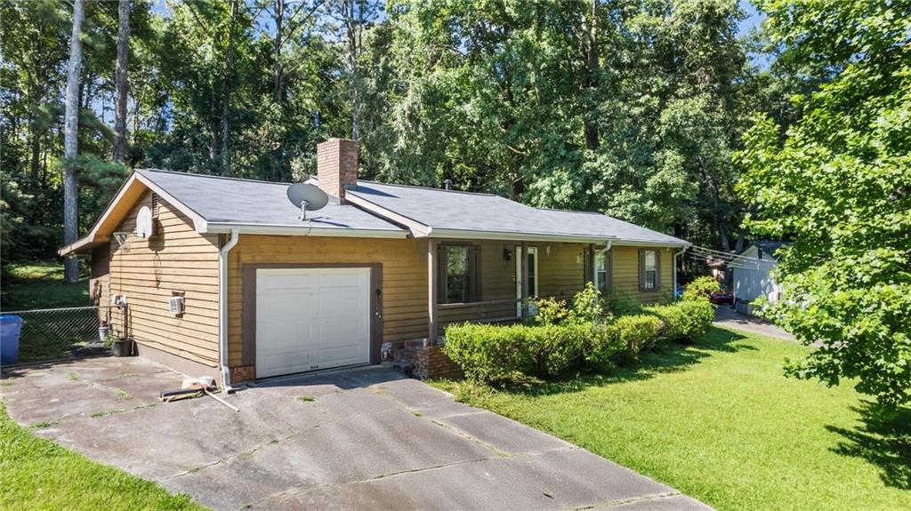 Investor Special on Quiet Cul-de-Sac – Tons of Potential! Located in a quiet cul-de-sac just minutes from I-75, shopping, and restaurants, this home offers a rare opportunity for investors or savvy home buyers looking to add value with a little TLC. Highlights include a private, level backyard, fireplace in the living room, large laundry room, and a stepless shower in the master bathroom. The roof is only 2 years old, and the interior HVAC unit was replaced in 2023, providing a solid foundation for the big-ticket items. All appliances remain, and there’s a one-car garage for added convenience. This home is situated in a quiet, established neighborhood, offering both privacy and convenient access to major amenities. With some cosmetic updates, it has the potential to shine, whether you're fixing it up to flip, rent, or occupy. Don't miss this opportunity—homes in this location go fast!