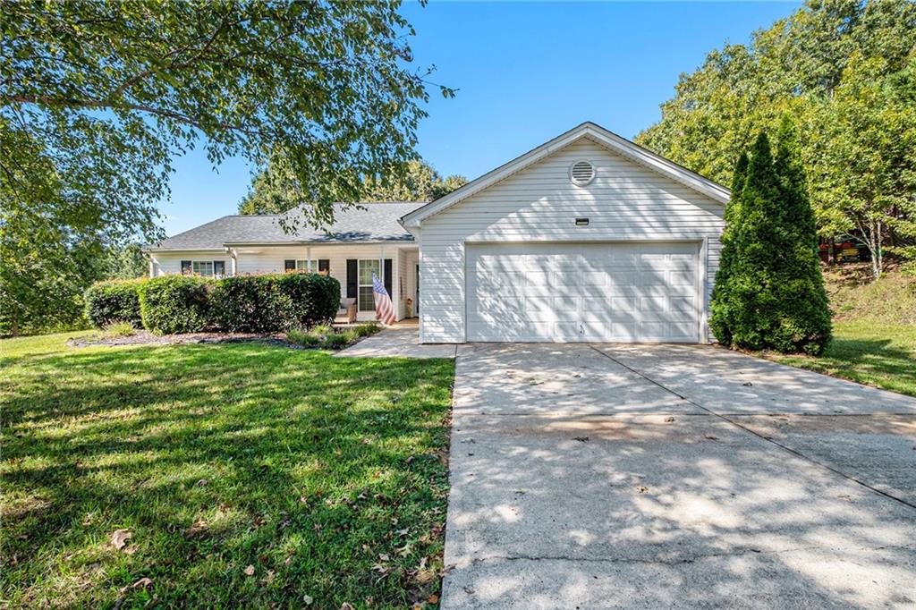 Welcome to 5312 Skyland Ct, a beautifully updated 3-bedroom, 2-bathroom ranch home on a spacious .65-acre lot with no HOA. This property blends comfort, efficiency, and peace of mind with major system upgrades already complete.
Step inside to discover hardwood floors in excellent condition throughout the main living areas, paired with a bright and functional kitchen featuring white cabinetry, stainless steel appliances, a breakfast bar, and a dedicated dining space that opens to the living room. The living area centers around a wood-burning fireplace, perfect for cozy nights at home.
The primary suite includes a walk-in closet and a private ensuite bath with a soaking tub and separate shower. Two additional bedrooms and a second full bath provide ample space for family, guests, or a home office.
This home has been thoughtfully maintained and upgraded with big-ticket improvements already done:
Roof: Approximately 2 years old
HVAC: Installed August 2023
Water Heater: Installed about 7 months ago
Solar Panels: Added in 2021, making this an all-electric home with very low monthly power bills
Septic System: Approved for 3 bedrooms.
The exterior offers as much charm as the interior. A rocking chair front porch overlooks the landscaped yard, while the open, fenced backyard is ready for entertaining with a patio, firepit, and above-ground pool (included as-is).
With no HOA, recent upgrades to all major systems, and a layout designed for both comfort and functionality, this home is move-in ready. Energy efficiency, thoughtful updates, and timeless curb appeal make 5312 Skyland Ct a property you don’t want to miss.
Schedule your private showing today—opportunities like this don’t last long!
