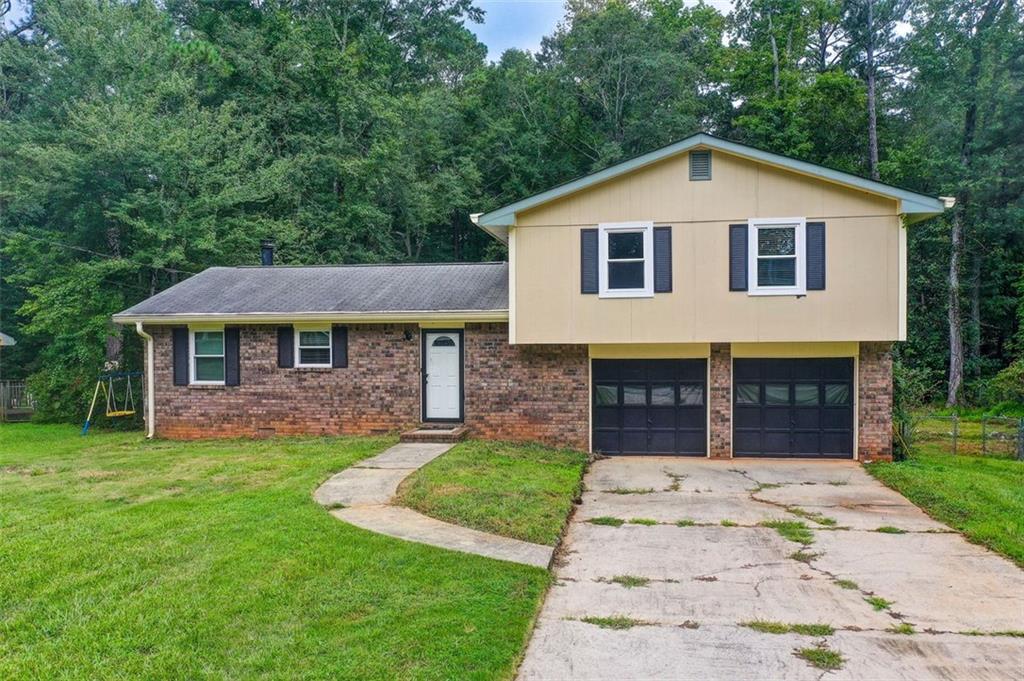 Affordable Brick Ranch with Room to Grow in Conyers, GA. Perfect for first-time buyers or Investors! This 3BR/2BA brick ranch offers 1,425 sq ft of space on over an acre of land in a quiet, established neighborhood. The home features a practical layout with a separate dining area, spacious living room, and good sized bedrooms. While it could use some updates, it's a
solid home with strong bones, and a prime location with great potential to make it your own. Located on the same street as new construction homes priced at $500k+, with additional developments of attached homes
nearby in the high $200ks to low $300k signaling strong upside potential in a rapidly growing area. You'll love the
convenience of nearby shops, restaurants, and entertainment -- all just minutes away. A great opportunity to get into a rising neighborhood at an affordable price! This property is a smart buy in a rapidly appreciating market.