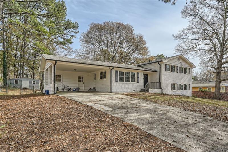 Short Sale Opportunigty...Totally Remodeled Brick Split Level with 5 Bedrooms & 3 Full Baths - Open Concept Main Level with Living & Dining Room, Eat-In Kitchen & Newly Finished Sun Room - Kitchen Features New Marble Floors, Smart Appliances, Farm Sink, Granite Counters & Backsplash & Gas Range - Terrace Level is Possible In-Law or Teen Suite with 2 Bedrooms, Full Bath, Rec Room & Laundry Room - There is Outside Access from Terrace Level & Crawl Space Access from Rec Room - New Double Pane Windows & Luxury Vinyl Plank Flooring Throughout - There's Storage Space Galore in the Storage Room Adjoining Carport & Separate Storage Building in Fenced Backyard, House is Conveniently Located to Schools, Shopping & Parks.