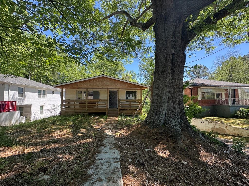 Investor Special! Priced to sell quickly, this charming bungalow in the heart of an up-and-coming Atlanta neighborhood offers endless potential. The home requires a full interior renovation down to the studs—perfect for buyers looking to customize or flip. Situated on a quiet street with easy access to downtown, Westside Park, and major highways, this property is a prime opportunity to invest in a rapidly developing area. Sold as-is, where-is. Bring your vision and make this gem shine!