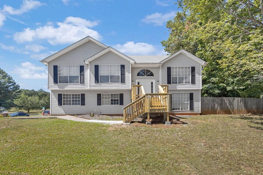 Spacious and full of potential, this 4-bedroom, 2.5-bath home is a great opportunity in a quiet Lithonia neighborhood. The main level features a bright and welcoming living area, a dining space ideal for entertaining, and a kitchen with plenty of room for everyday cooking. Upstairs, the primary suite includes its own private bath, while three additional bedrooms and a full hall bath provide comfort and flexibility for family, guests, or home office needs. A half bath on the main floor adds convenience. The level backyard offers space for outdoor enjoyment, gardening, or relaxing weekends at home.
Living in Lithonia means easy access to Stonecrest Mall, Arabia Mountain trails, and quick connections to I-20 for commuting into Atlanta or Decatur. This home delivers both space and convenience, making it a smart choice for your next move.
Make a great deal even better with Massive savings through special loan programs with the Preferred Lender Envoy Mortgage with Aubrey Wilcox! Ask the Listing Team for the introduction for up to 100% Financing or even interest rates in the 4s!