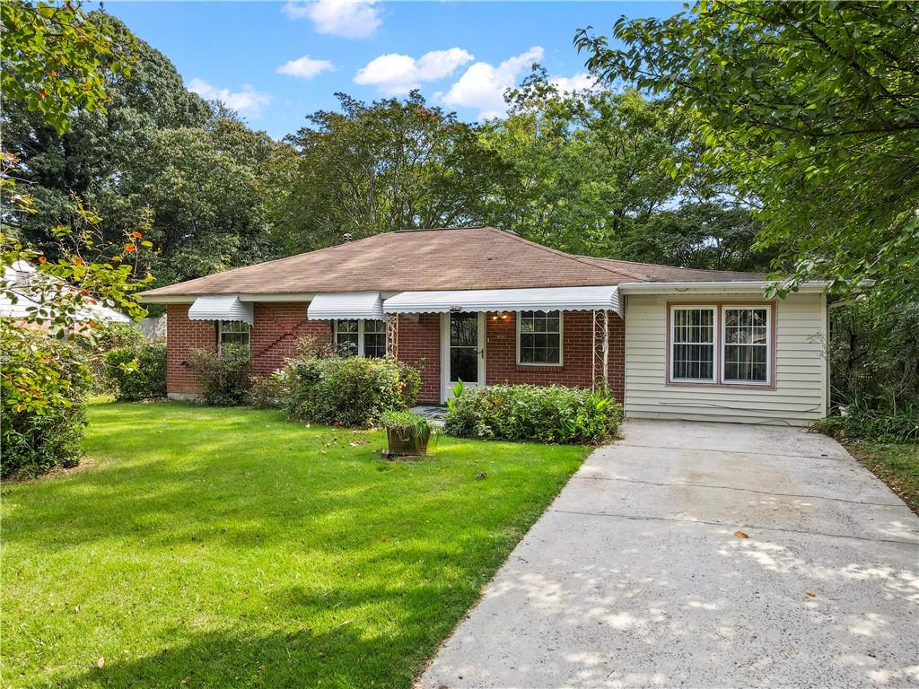 Welcome to this classic 3-bedroom, 1-bath brick ranch with a blend of updates and original character. The home features an updated kitchen with fresh cabinetry and countertops, as well as new flooring throughout the main living spaces. Enjoy the comfort of a screened-in back porch, perfect for relaxing or entertaining while overlooking the large, fenced-in backyard. The property also includes a storage shed, offering plenty of space for tools, hobbies, or seasonal items. Conveniently located with a spacious backyard, this home is full of potential.