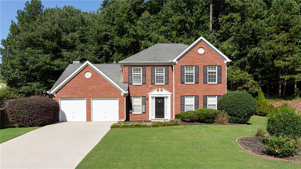 Must See!! This inviting two story traditional 3 bedroom/2.5 bathroom home, in the desired Vinings Cove Community has a spacious main level includes hardwood floors w/separate dining, office space, and even a playroom. Views from the kitchen to living/great room with new carpet & gas fireplace. Walk-in pantry and kitchen nook area for the extra seating area. Upstairs features three bedrooms w/two bathrooms including the oversized owner's suite and owner's suite bath w/separate tub/shower and walk in closet. Relax or entertain in the spacious backyard great for kids/pets/and cookouts! Walk-in laundry on main and a sizable 2 car garage. Active community w/swim/tennis, park, sidewalks and streetlights for those evening strolls. Close to award winning schools, silver comet trail, shopping, dining, and parks. This won't last long!