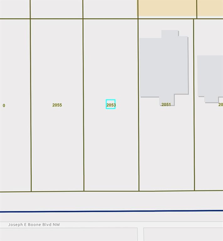 One of two adjacent C-1 lots for sale in Grove Park in the Westside Park Affordable workforce housing overlay. Lot Measures 50' x 150'