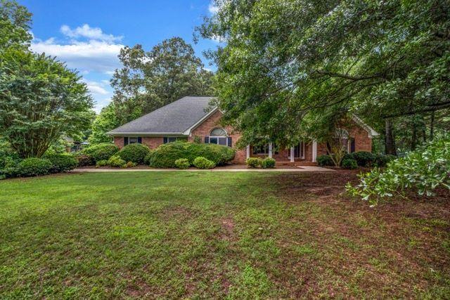 Welcome to 362 Clyde Court in McDonough, Georgia. This stately four bedroom, two bathroom brick home offers 4,359 square feet of well-designed living space. Built in 1995, this spacious single family residence combines timeless charm with functional comfort. It is set on a solid crossed wall foundation and features a durable asphalt roof. The interior showcases a mix of quality flooring, including hardwood, tile, carpet, concrete, and other custom finishes. A welcoming fireplace adds warmth and character, making it ideal for both relaxing evenings and entertaining guests. Constructed with a blend of brick and wood materials, this home offers lasting value and impressive curb appeal.