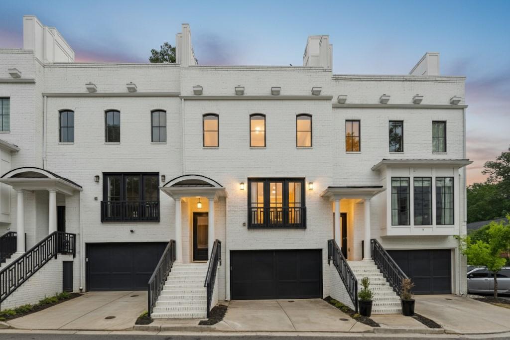 Live the Buckhead lifestyle in this stunning 3-bedroom, 3.5-bathroom townhome with a private ROOFTOP TERRACE! Fully upgraded unit, featuring a built-in ELEVATOR SHAFT for future installation, this spacious residence offers over 2,800 square feet of refined living space in one of Atlanta’s most prestigious neighborhoods—just steps from Phipps Plaza, Lenox Square, and some of the city’s best dining and entertainment.
Designed for both comfort and style, the open-concept floor plan features a welcoming great room with a cozy fireplace and an elegant dining area, perfect for everyday living or entertaining. The gourmet kitchen is a chef’s dream, complete with a massive island, stainless steel appliances, white cabinetry, quartz countertops, and direct access to a private balcony—ideal for morning coffee or evening cocktails. The primary suite provides a serene retreat, offering ample natural light, a luxurious spa-like bathroom with a double vanity, soaking tub, glass-enclosed shower, and a spacious walk-in closet. The upper level includes two additional bedrooms, each with its own private full bathroom, while the lower level offers a versatile bedroom and full bath, perfect for guests, a home office, or a private gym. At the top of it all, the rooftop terrace steals the show—complete with an outdoor fireplace and breathtaking skyline views, creating an unbeatable space for hosting or relaxing under the stars.Additional highlights include hardwood flooring throughout, high ceilings, upgraded lighting, and easy access to major highways, parks, and cultural attractions. Don't miss this rare opportunity to own a fully upgraded, move-in ready home with luxurious amenities and an unbeatable Buckhead location!
