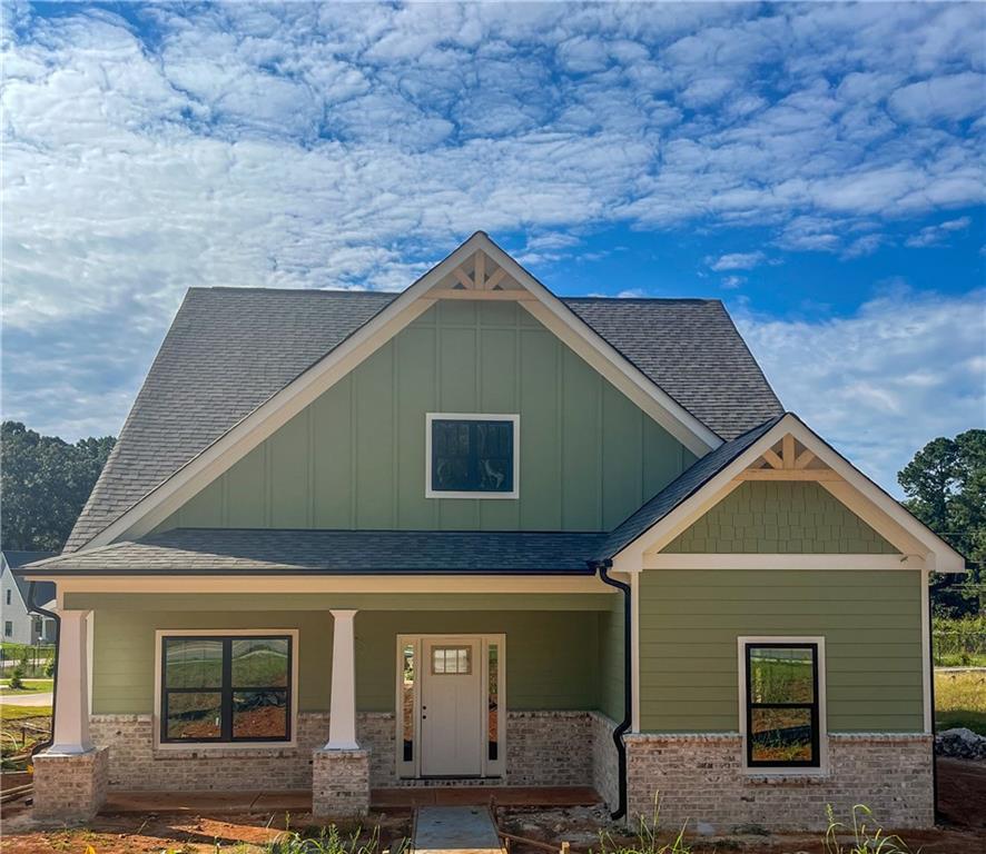 THE LOLA PLAN- CURRENTLY UNDER CONSTRUCTION OCTOBER COMPLETION! Fall into savings with 4.99% fixed rate or $20,000 of builder incentives* with September contract. Call us for details! Location, Location, Location! Welcome to Ferguson Corners—a boutique, semi-custom community by MarDon Construction, known for its exceptional craftsmanship and luxury finishes. The Lola Plan blends style and functionality with custom architectural details throughout. The gourmet kitchen is a true showstopper, featuring stainless steel appliances, quartz countertops, a spacious center island, and open sightlines into the family room—ideal for entertaining. The main level also offers a stylish home office, a mudroom, and a covered rear patio. The elegant primary suite includes a generous walk-in closet, spa-like en suite bath, and private access to the laundry room. Upstairs, you'll find three additional bedrooms, two full bathrooms, and a versatile loft/bonus area. Conveniently located just minutes from Downtown Emerson, Downtown Cartersville, Red Top Mountain, and Lake Allatoona—this community offers an unmatched lifestyle. *The incentive is subject to lender and government restrictions. The offer is subject to change or may be discontinued. Your actual mortgage interest rate, APR, and closing costs may vary based on the loan product, your application and qualifications, and based on applicable closing costs and fees.*