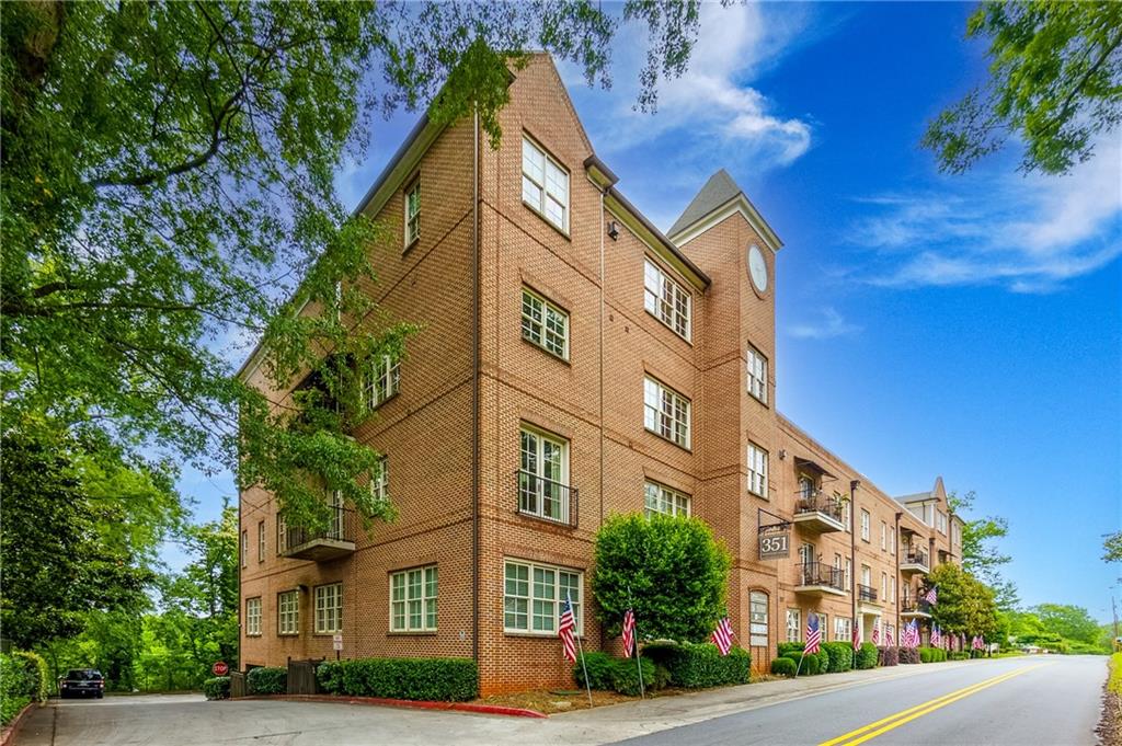 Prepare to be enchanted by this extraordinary property, a true gem that effortlessly combines elegance with functionality. This 4 sided brick condominium exudes such charm with a warm inviting entrance. As you step inside, you are welcomed into a grand foyer that sets the tone for the entire residence. As the original model home, this condo has many carefully chosen finishes. The French doors off the family room open up to a balcony where you can enjoy your morning cup of coffee. You will also enjoy a front row seat when the yearly firework festivities from the Marietta Square begin! Adjacent to the living room is the gourmet kitchen, a culinary haven that is designed for those who adore cooking and entertaining. Featuring state-of-the-art Bosch appliances, exquisite cabinetry, and ample counter space. Be sure to check out the roof top deck and community gathering room for your next event. Don’t miss the chance to make this exquisite residence your own.